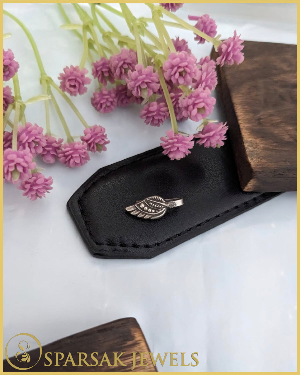 Silver Nose Pins Set with Filigree Work by Sparsak Jewels