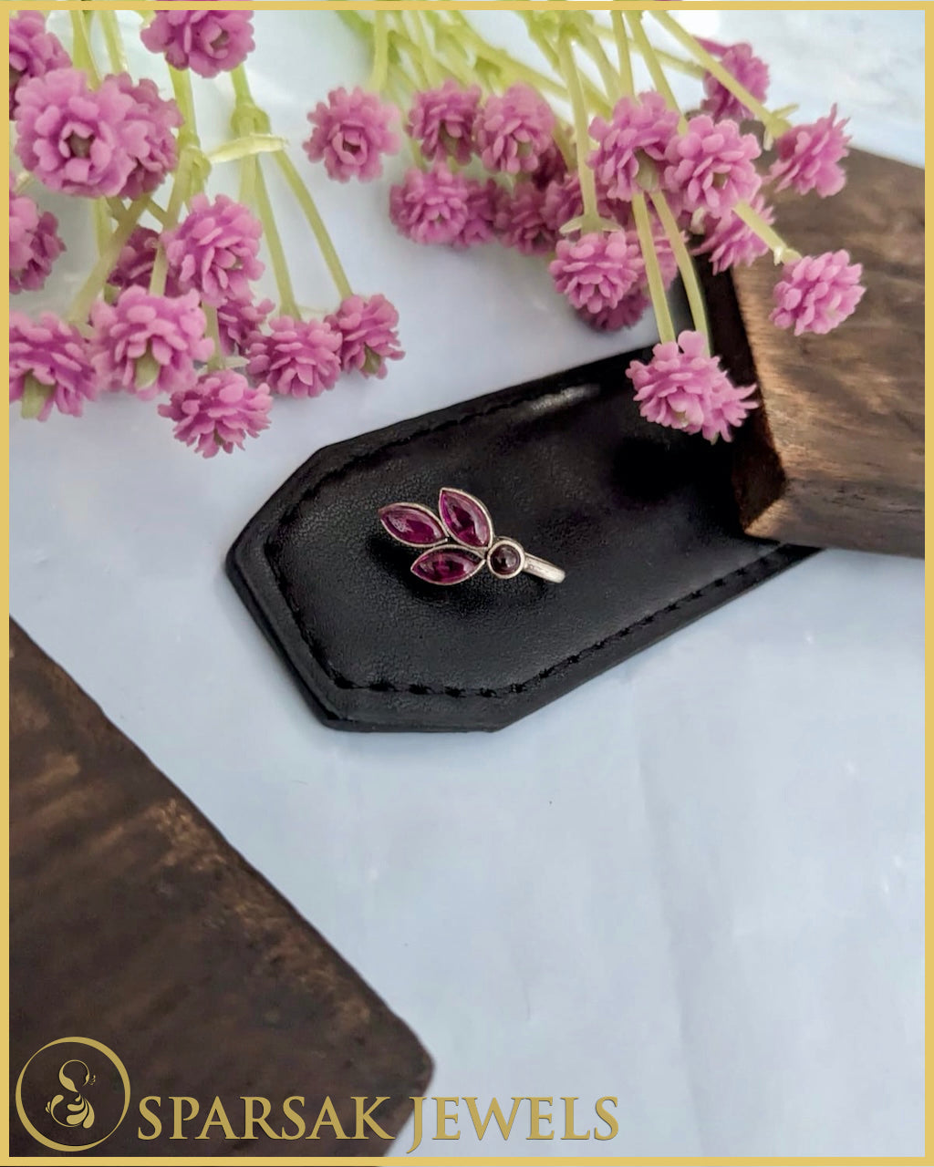 Silver Nose Pins Set with Filigree Work by Sparsak Jewels