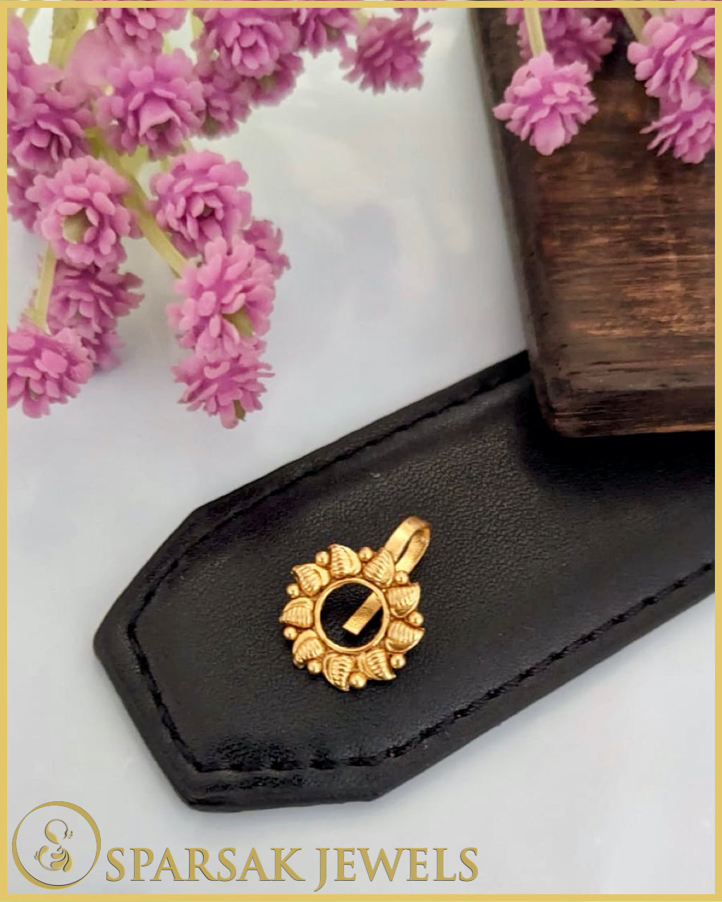 Silver temple nosepin with artisan craftsmanship on blue background