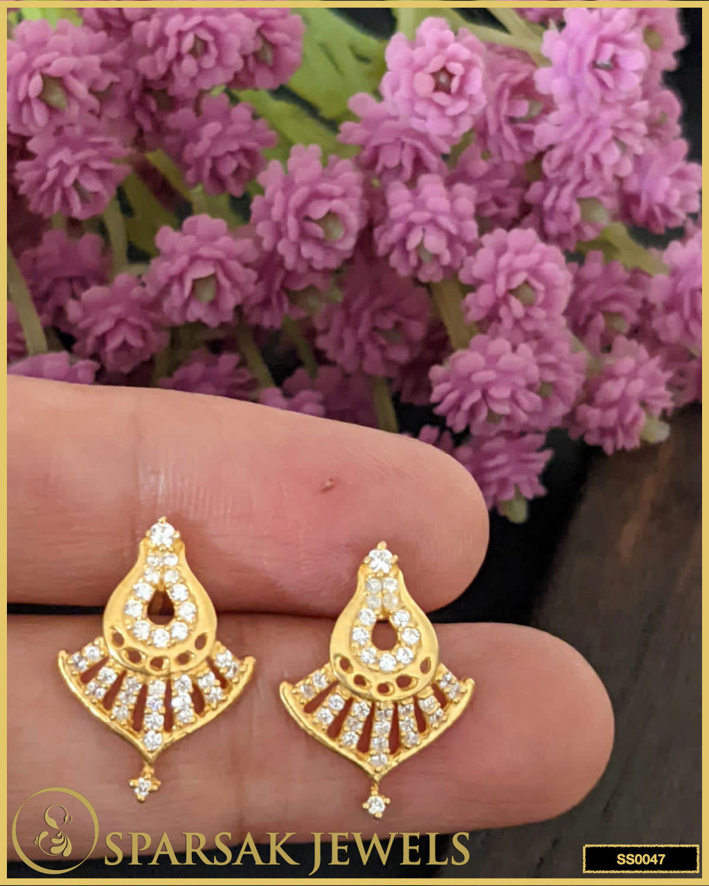 Gold-polished small silver stud earrings styled on a white background.