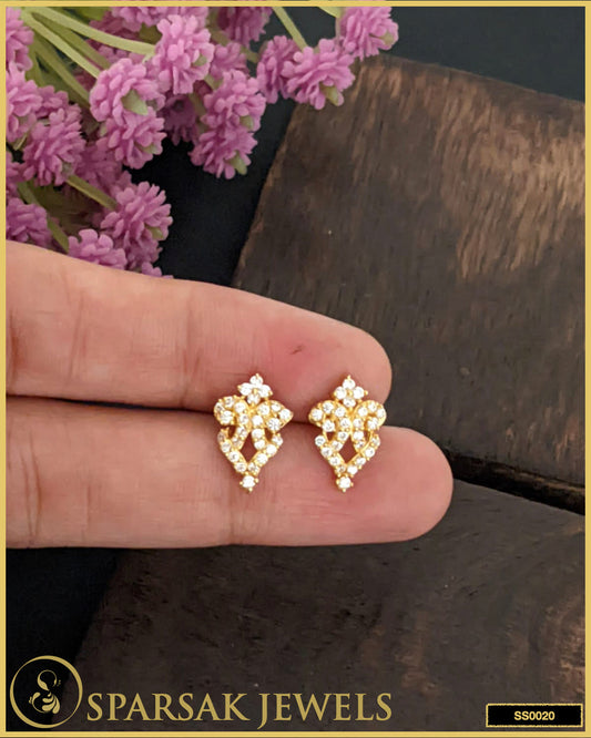 Gold-polished silver stud earrings with modern chic design on white background.