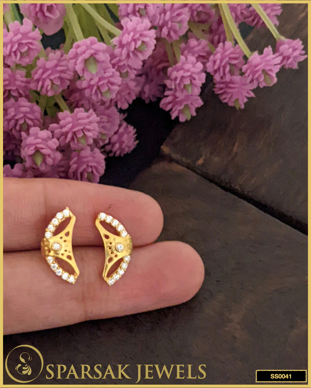 Gold-polished silver earrings studs with classic design on white background.